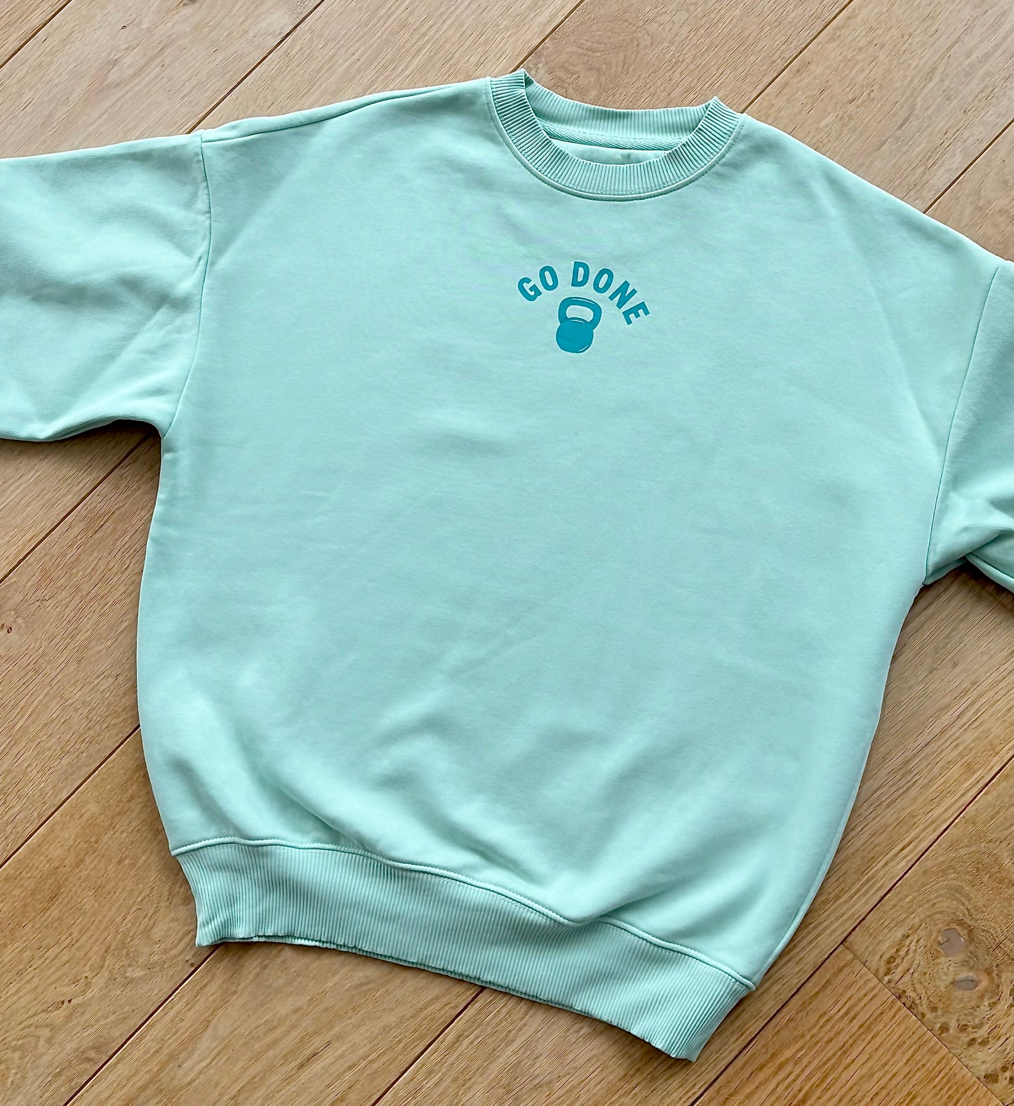 Pull Go Done vert eau unisexe